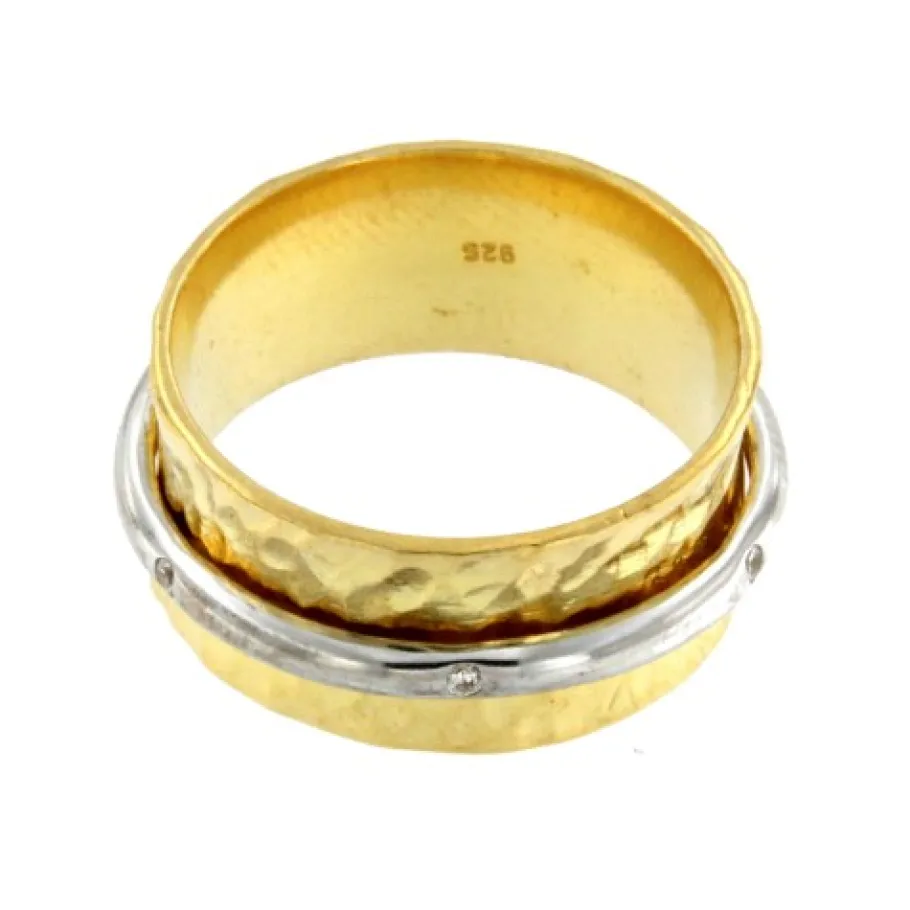 adelfa_anillo_martele_en__1.webp Roman Joyero Anillos<ADELFA, anillo martele en plata con circonitas.