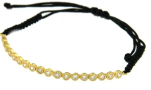 Roman Joyero Pulseras<AMARILLO, pulsera de macramé con plata dorada.