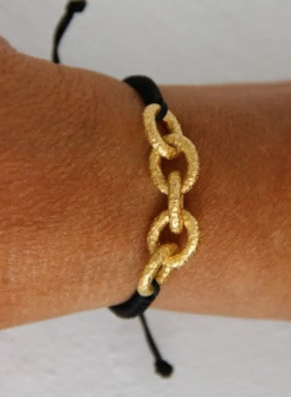 Roman Joyero Pulseras<AZUL, pulsera de macrame con plata dorada.