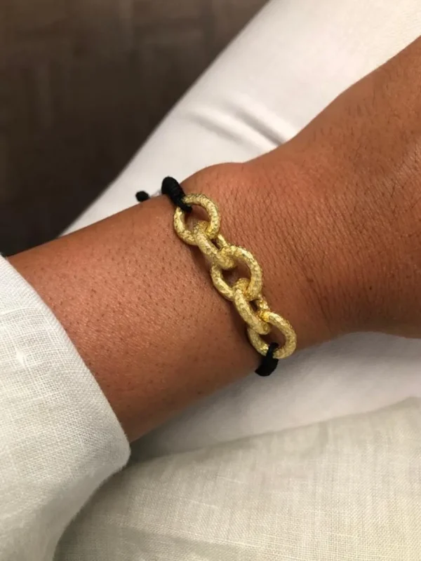 Roman Joyero Pulseras<AZUL, pulsera de macrame con plata dorada.
