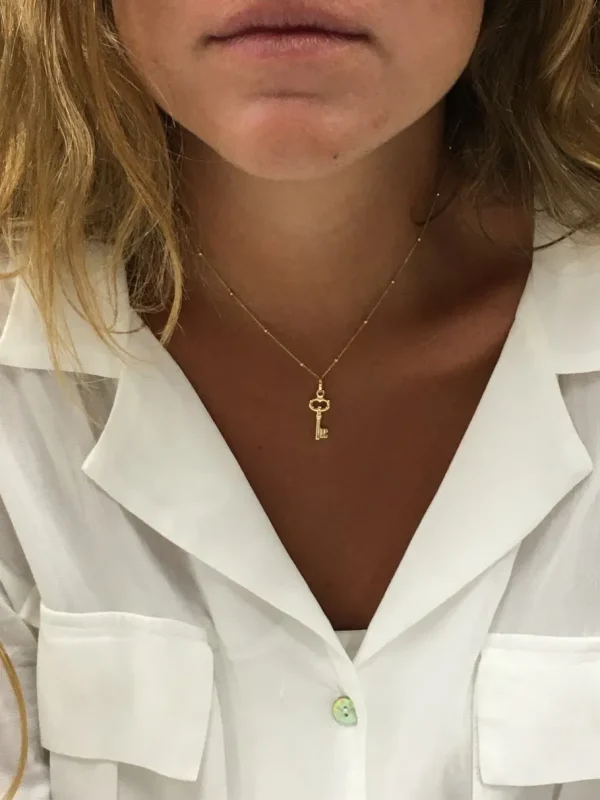 Roman Joyero Colgantes<Colgante con un motivo llave AFRA en oro amarillo 18 Kilates.