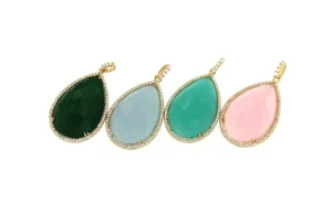 Roman Joyero Colgantes<Colgante de plata dorado y piedra central amazonite.