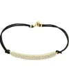 Roman Joyero Pulseras<GOETHE, pulsera de plata con macrame.
