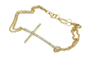 Roman Joyero Pulseras<HARVARD, pulsera de plata dorada con cruz y circonitas.