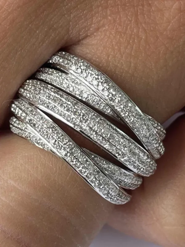 Roman Joyero Anillos<LUCCA, anillo de oro y varios aros diamantes.