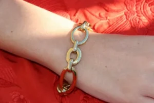 Roman Joyero Acero<Pulsera de acero dorada con argollas barbadas.
