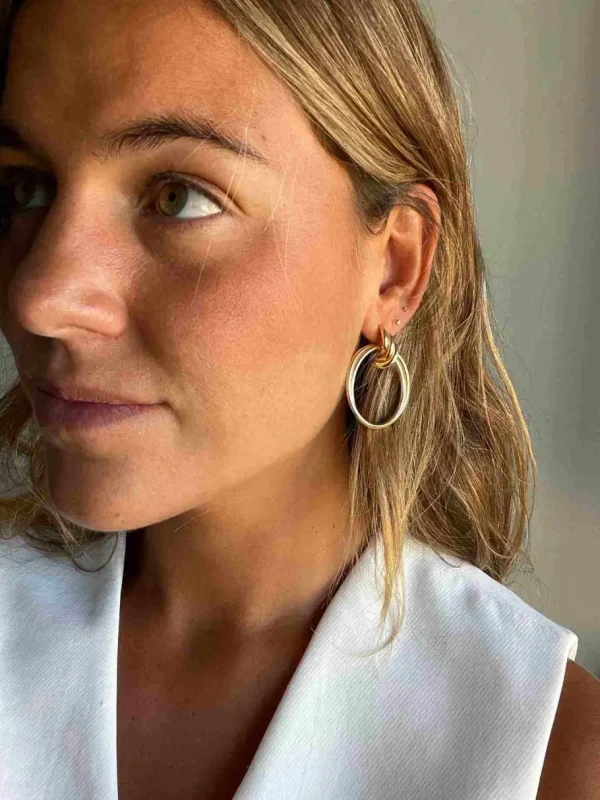 Roman Joyero Pendientes<SIGFRIDO pendientes argollas cruzadas en plata 1ª ley bañado oro