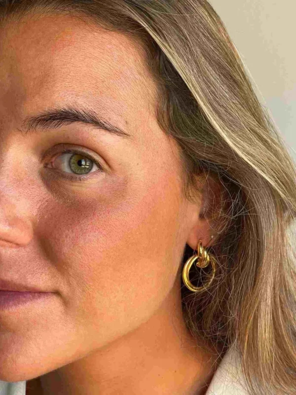 Roman Joyero Pendientes<SIGFRIDO pendientes argollas cruzadas en plata 1ª ley bañado oro