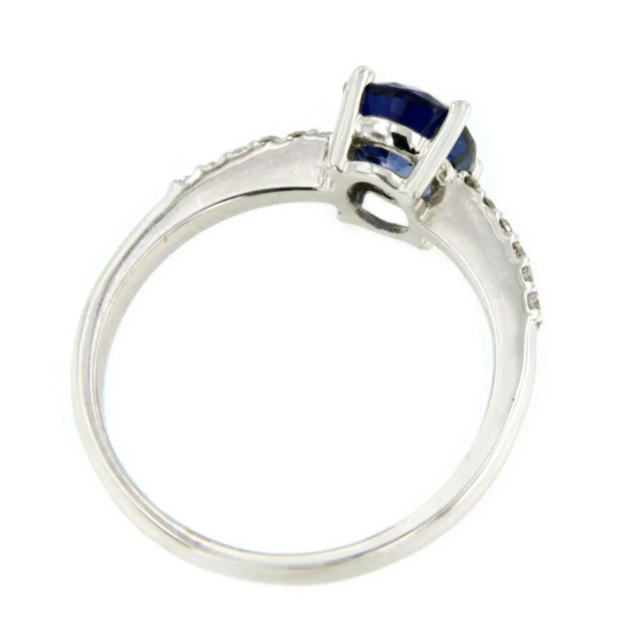 tolima_anillo_zafiro_rubi_4.webp Roman Joyero Anillos<TOLIMA, anillo zafiro, rubi y esmeralda en oro blanco y brillantes.