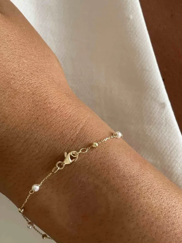 Roman Joyero Pulseras<ZANEL pulsera perlas y bolitas en oro amarillo de 18 ktes